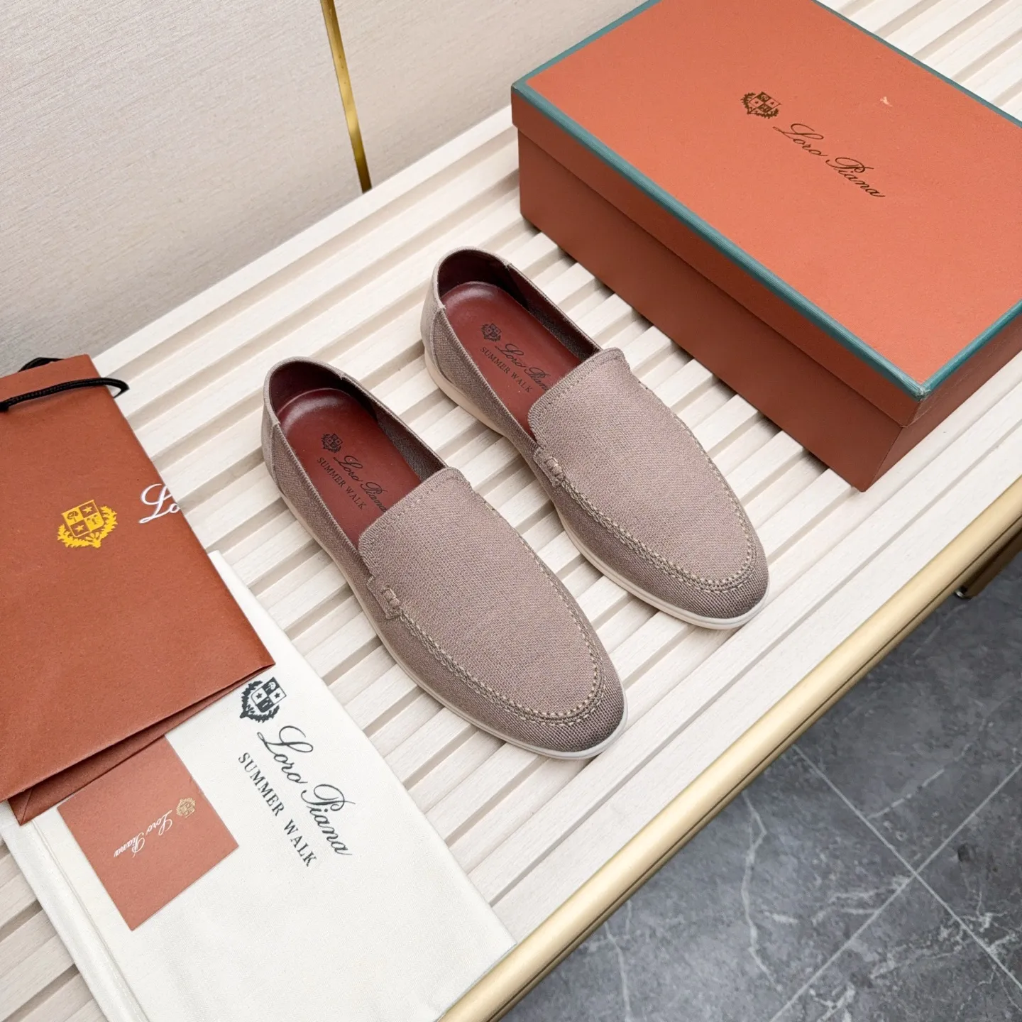 Men's Men's Shoes 💰400 Loro PIana moccasins are made of wish wool fabric. The upper is made of knitted fabric, made on a loom, and then attached to a rubber sole. The Rain System's water-repellent treatment enhances the shoe's functional design, while the suede details give the shoe a sense of elegance and sophistication. Made from Wish, fine wool from Australian and New Zealand Merino sheep